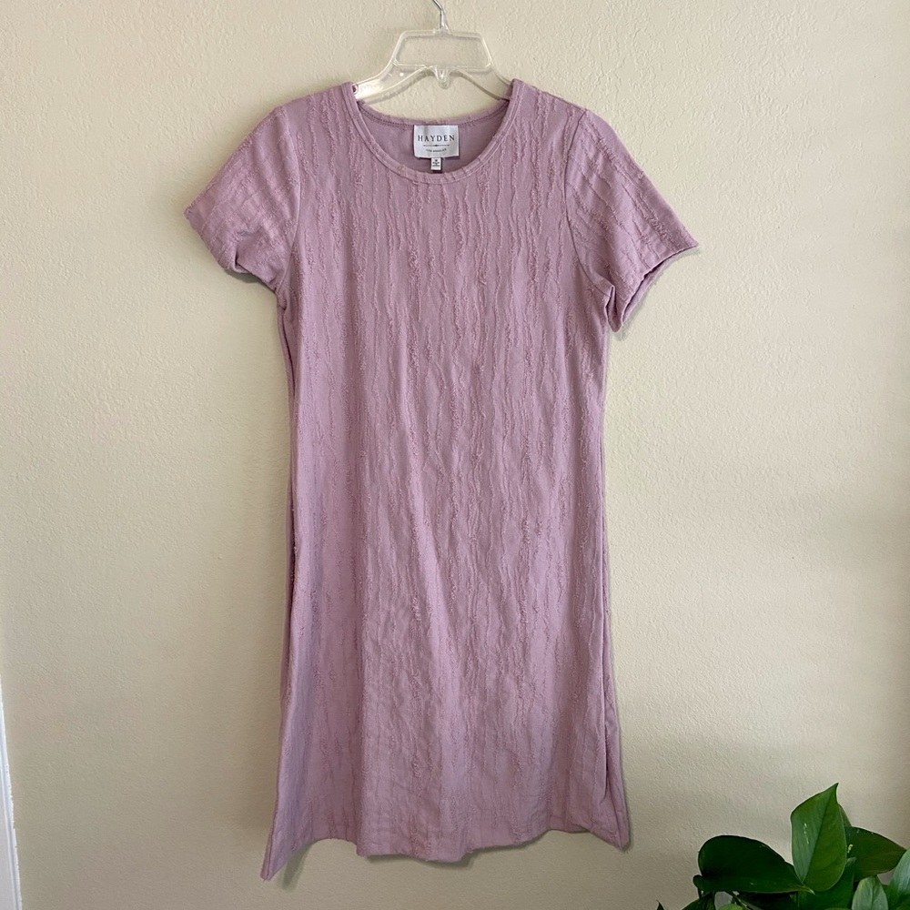 Lavender t-shirt dress with stitching detail.